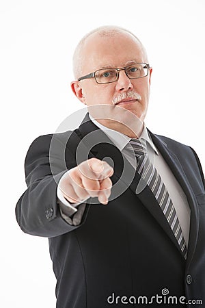 Strict mature businessman indicating you Stock Photo