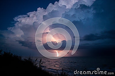 Strike of lightning from big beautiful cloud after storm Stock Photo