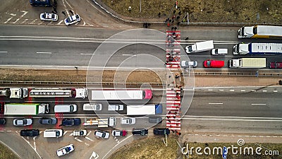 Strike and protest of people. Blocked the road. Crowd of annoyed protesters blocking road with demands to government Stock Photo