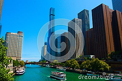 Striking view of Chicago city skyscrapers towering over an urban river Editorial Stock Photo