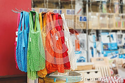 String bags. Store with many different colors string bags, basket. No plastic, zero waste concept store. Recyclable reuse shopping Stock Photo