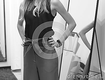 Striped bow on the trousers - Fashion details Stock Photo