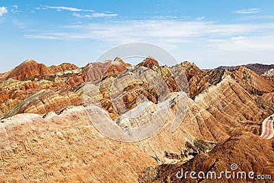 Striped rock formations in Danxia Feng, or Colored Rainbow Mountains, in Zhangye, Gansu Stock Photo