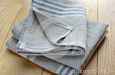 Striped rough heavy linen kitchen or hand towels. Home textile Stock Photo