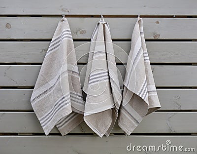 Striped rough heavy linen kitchen or hand towels. Home textile Stock Photo