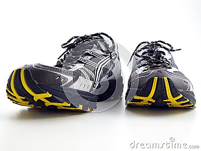 Striped Running Shoes on white front view Stock Photo