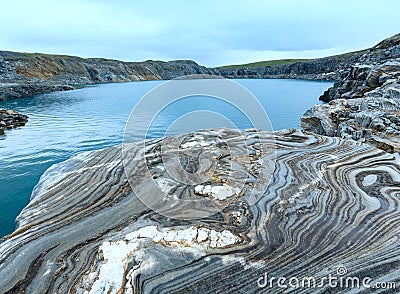 Striped stone near reservoir Storglomvatnet (Norge) Stock Photo