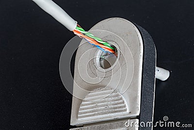 Stripping Ethernet cable Stock Photo