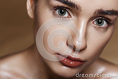 Strobing or Highlighting makeup. Closeup portrait of beautiful g Stock Photo