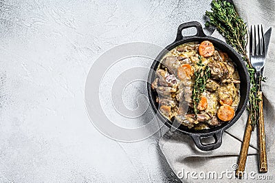 Stroganoff chicken liver with mushrooms and cream. White background. Top view. Copy space Stock Photo