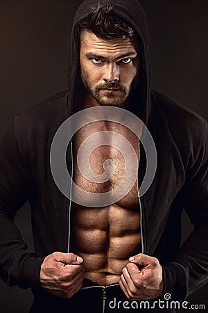 Strong Athletic Man Fitness Model Torso showing big muscles Stock Photo