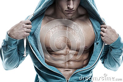 Strong Athletic Man Fitness Model Torso showing six pack abs. is Stock Photo