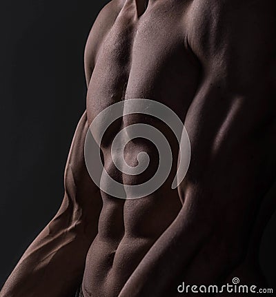 Strong Athletic Man Fitness Model Torso showing big muscles Stock Photo
