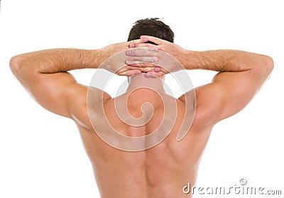 Strong athletic man showing muscular back Stock Photo