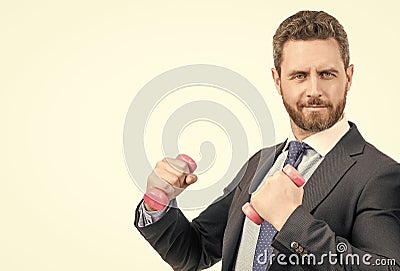 Strong businessman man do dumbell workout using hand weights, business strength Stock Photo
