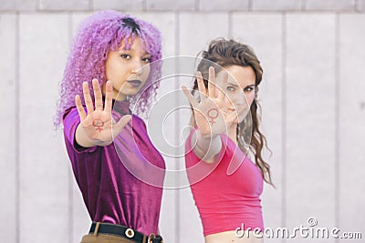 Strong independent women fighting for equality of gender with th Stock Photo