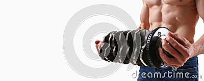 Strong male hands hold the crankshaft on a gray background Stock Photo