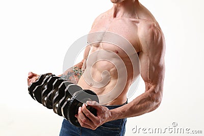 Strong male hands hold the crankshaft on a gray background Stock Photo