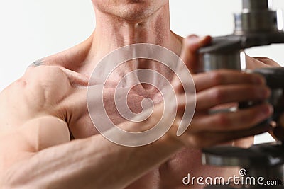 Strong male hands hold the crankshaft Stock Photo