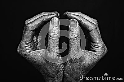 Strong male hands in silver paint Stock Photo