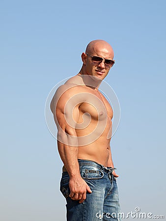 Strong man with nude torso Stock Photo