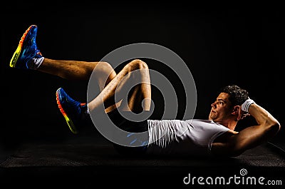 Strong man working abs Stock Photo