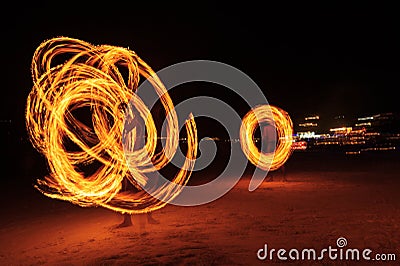 Strong Men Juggling Fire in Thailand Stock Photo