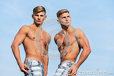 Strong muscles emphasize masculinity sexuality. torso attractive macho. Attractive twins. Men muscular athlete Stock Photo