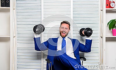 Strong powerful business strategy. Man raise heavy dumbbells. Boss businessman manager raise hands with dumbbells. Sport Stock Photo