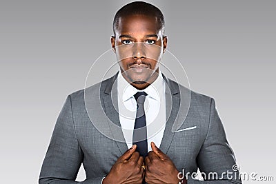 Strong powerful modern businessman pose looking confident successful accomplished driven intense Stock Photo