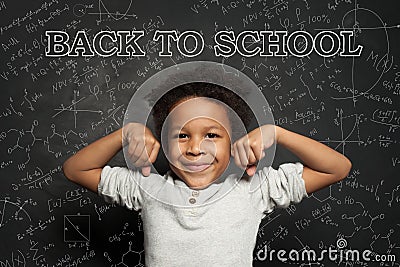 Strong smart happy black child boy student portrait. Back to school concept Stock Photo