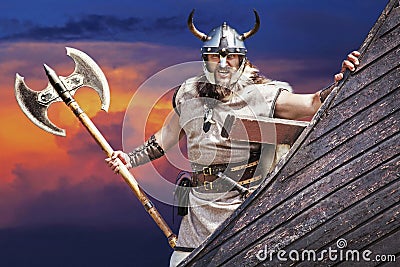 Strong Viking on his ship. Stock Photo