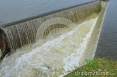 Strong waterfall from side channel spillway Stock Photo