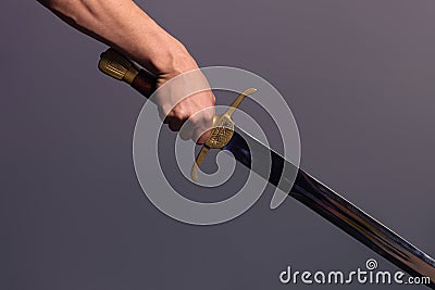 Young Athletic Man Holding His Sword Stock Photo