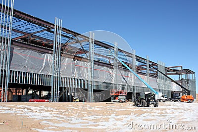 Structural Framers Weld Metal Studs from Manlifts Stock Photo