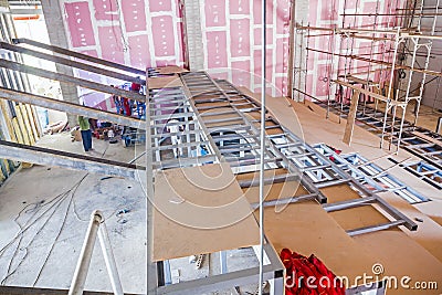 Structure girders on metal skeleton at indoor building site Stock Photo