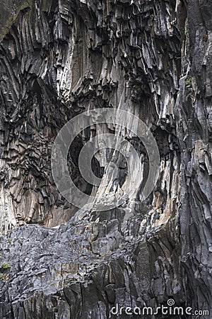 Structures of basalt lava cliffs in Gole dellâ Alcantara gorge close to Taormina, Sicily Italy Stock Photo