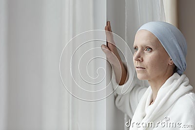 Struggling with cancer alone Stock Photo