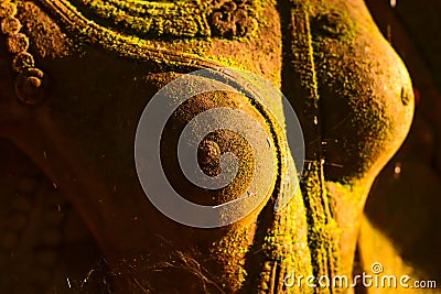 Stucco Goddess Sacred With green moss Stock Photo