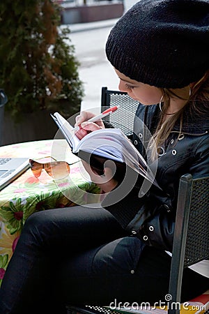 Student in cafe street in old city Stock Photo