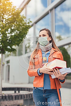 Student during covid-19 cannot enter closed university building Stock Photo