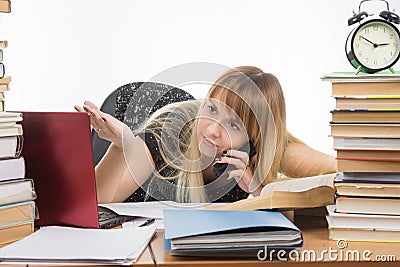 Student discusses by phone coursework Stock Photo