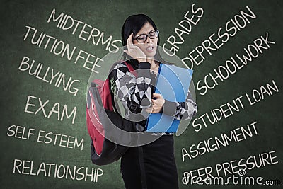 Student feel dizzy to think her problems Stock Photo