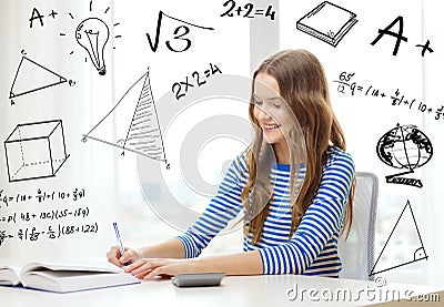 Student girl with book, notebook and calculator Stock Photo