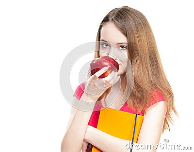 Student girl eating apple. Stock Photo