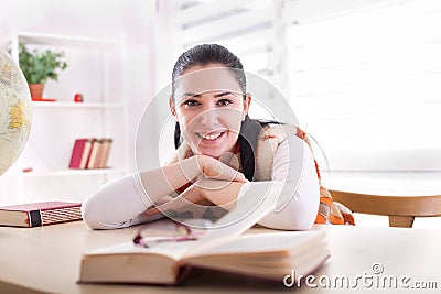 Student girl studying from books Stock Photo