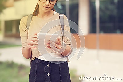 Student girl with tablet in campus Stock Photo