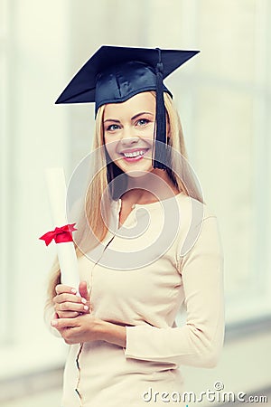 Student in graduation cap with certificate Stock Photo