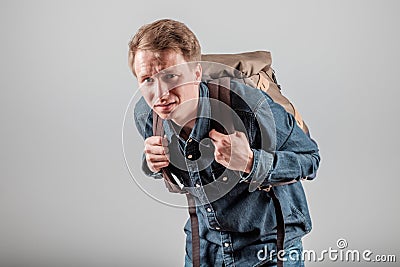 Student with a heavy backpack Stock Photo