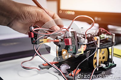Student learning STEM Education robotics for creating project based studying for innovation robot model. New study generation for Stock Photo